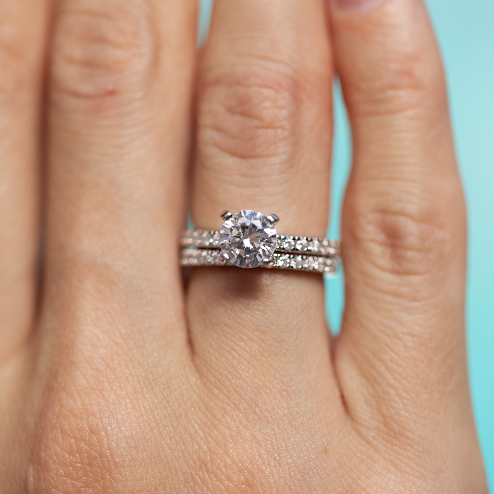 Lustrous Promise Moissanite Ring